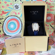 Rare Links of London Driver Ellipse Watch with Mother of pearl face, 10 Sapphire Crystals a Blue Real Leather Strap.