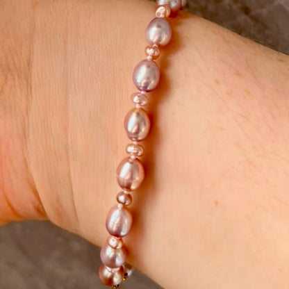 Stunning Pink Cultured Freshwater Pearl Bracelet with a delicate 9ct gold clasps securing it perfectly.  Hallmarked 375 on the clasp presented in a beautiful wooden box
