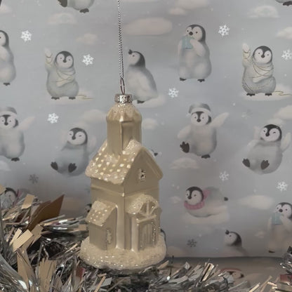 shimmering  champagne glass church Christmas ornament accented with sparkling glitter snow details