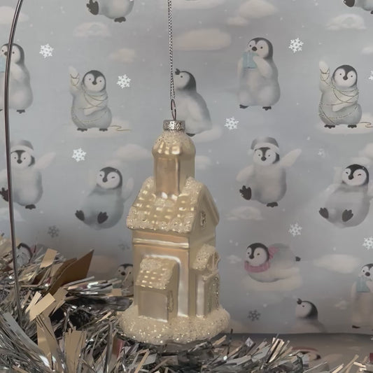 shimmering  champagne glass church Christmas ornament accented with sparkling glitter snow details
