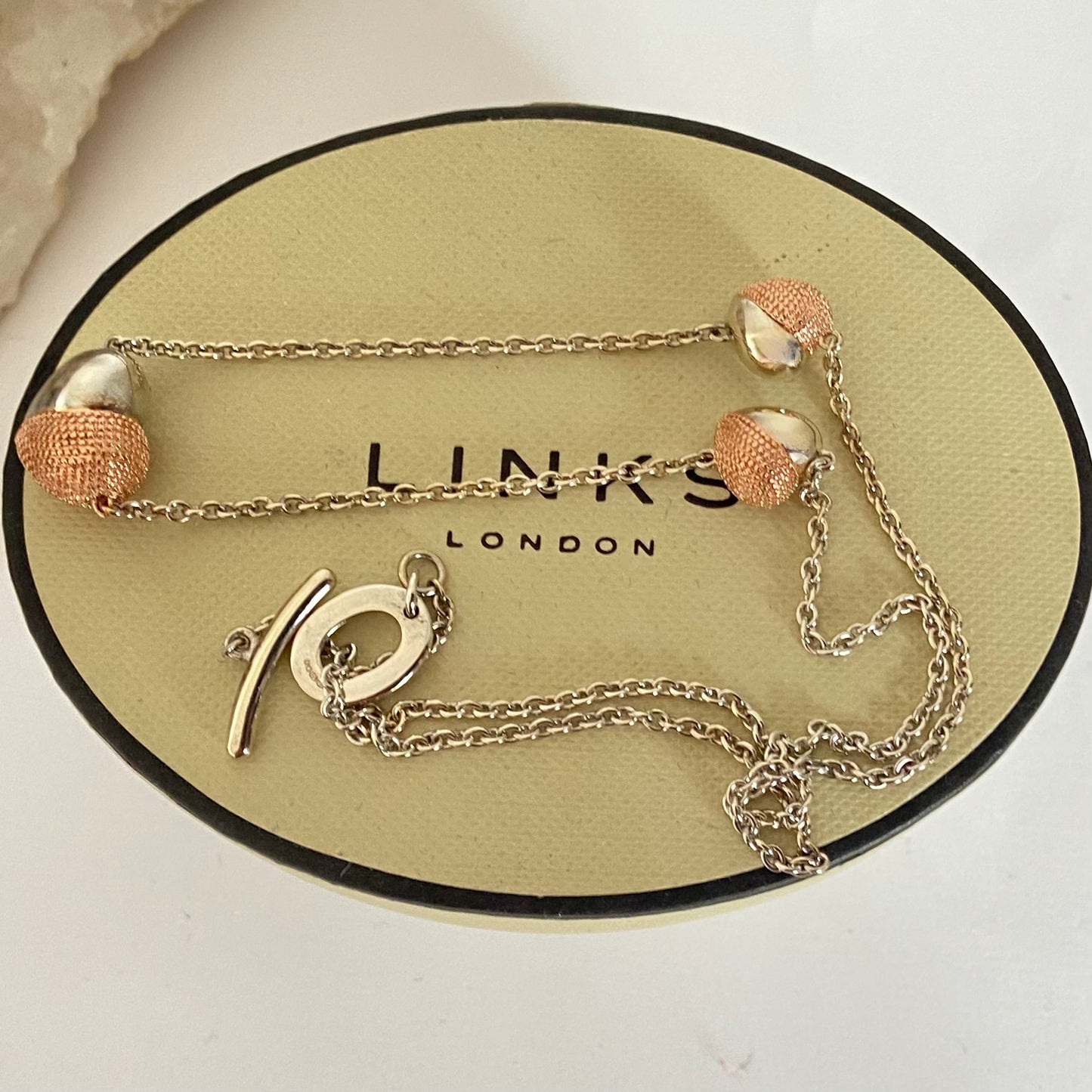 Links of London  Masquerade Necklace with Three hearts in Gold 18ct Vermeil.