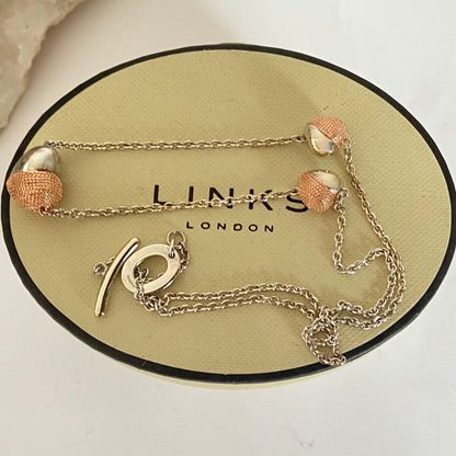 Links of London  Masquerade Necklace with Three hearts in Gold 18ct Vermeil.